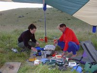 Preparing a meal in camp